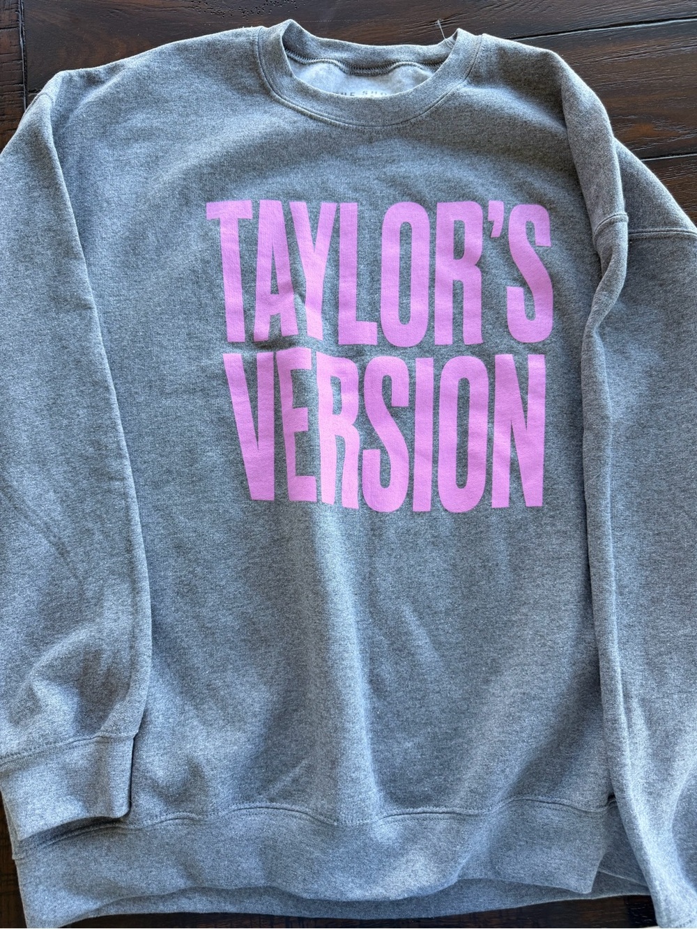 Gray Sweatshirt with Purpke 'TAYLOR'S VERSION' Text from The Shop Forward